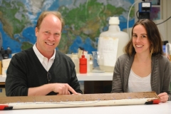 Jessica Tierney and co-author Peter deMenocal point out Saharan dust in a sediment core from off West Africa. Credit: Lamont Doherty Earth Observatory
