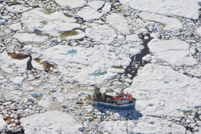 A crab fishing boat trapped in the multiyear sea ice off the Newfoundland coast.  Credit: David G. Barber.