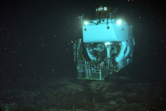 Here is Alvin working on the seafloor at Axial Volcano on the Juan de Fuca Ridge. The seafloor here is made up of recent lava flows. Credit: P. Gregg (U. Illinois), D. Fornari (WHOI), M. Perfit (U. Florida), co-chief scientists of OASIS cruise AT37-05 on RV Atlantis funded by the National Science Foundation.
