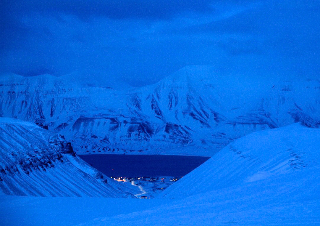 The small town of Longyearbyen is home base for researchers who study ice caves in Svalbard. Credit: Kiya Riverman.